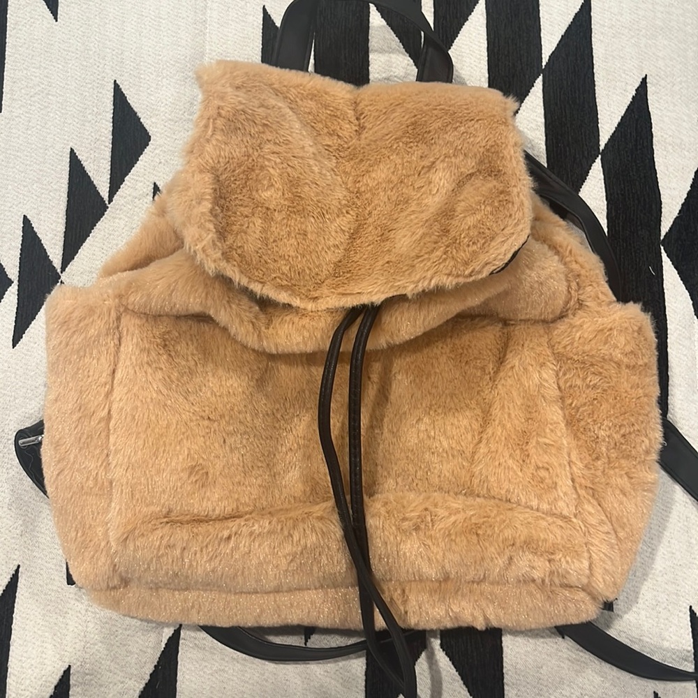 BNWT, tan, faux fur backpack purse.